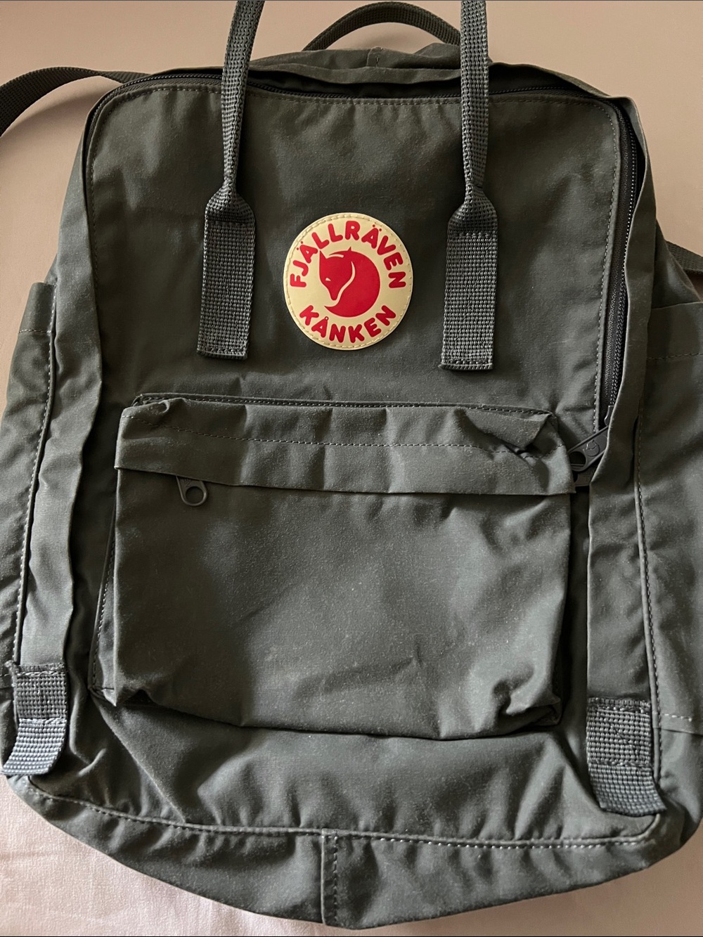 Fjallraven Kånken Backpack in Dark Grey with Red Logo